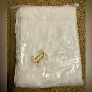 New old Stock luxury, crisp, white linen napkins with gold embroideredletter set